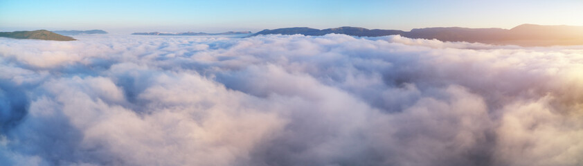 Aerial view white clouds in blue sky at morning.