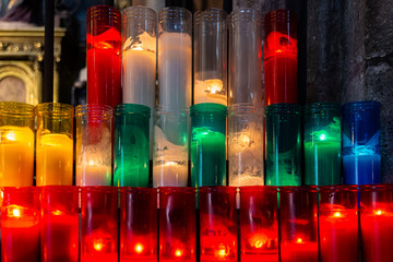 Colorful policrome candles inside Esglesia de Santa Maria del PI. Barcelona.