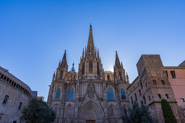 Fototapeta premium The Cathedral of Barcelona, detail of the main facade in typical gothic style with stone friezes and gargoyles. Barri Gotic, Barcelona