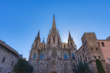 Fototapeta premium The Cathedral of Barcelona, detail of the main facade in typical gothic style with stone friezes and gargoyles. Barri Gotic, Barcelona