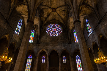 Interior of Santa Maria del Mar Basilica in typical Catalan Gothic style with pointed arches and...