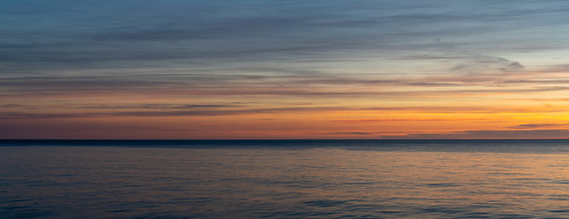 Obraz premium Etretat, France - 05 31 2019: sunset over the sea of Etretat