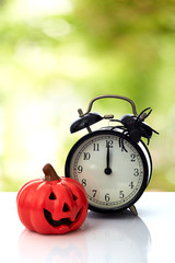 Clock with spider for Halloween celebration