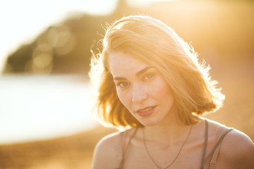 bright picture of beautiful woman on a beach