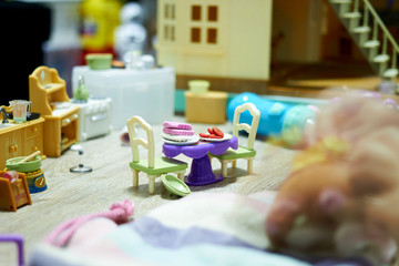 Toy foods on table in doll house
