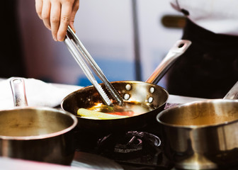 Chef cooking food in the kitchen, Chef preparing food