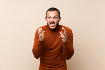 Colombian man with turtleneck sweater frustrated by a bad situation