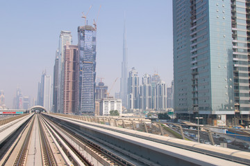 Fototapeta na wymiar Dubai skyline from Dubai Metro train, in Dubai, United Arab Emirates