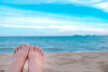 feet on the beach