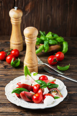 Italia salad caprese with tomato, basil and mozzarella