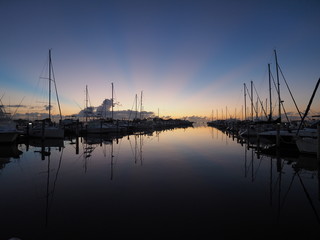Fototapeta na wymiar Sunrise over Dinner Key Marina in Coconut Grove, Miami, Florida.
