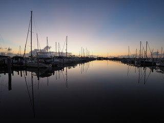 Fototapeta na wymiar Sunrise over Dinner Key Marina in Coconut Grove, Miami, Florida.