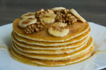 Pancakes with bananas, walnuts and honey