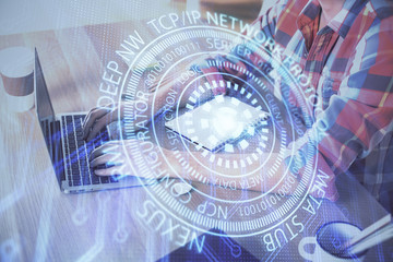 Businessman with computer background with technology theme hologram. Concept of big data. Double exposure.