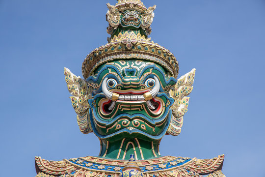 Giant Demon Guardian Standing in  Front of Wat Phra Kaew (Grand Palace) Door in Bangkok Thailand