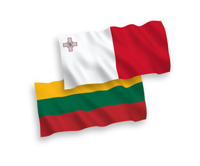 National vector fabric wave flags of Lithuania and Malta isolated on white background. 1 to 2 proportion.