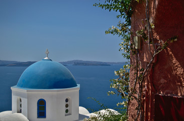 The Roofs of Oia, overlooking the crater of the old Volcano (Caldera)