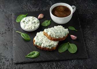 Ricotta cheese spinach sandwich with coffee. healthy breakfast