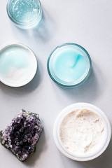 Female skin and body care cosmetic products set flatlay. Overhead, minimalism, beauty blogging concept