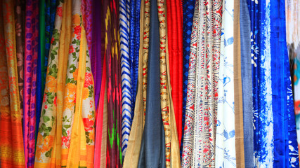 Colorful Indian women costumes up for sale.