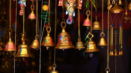 Bronze Hindu holy bells against black background
