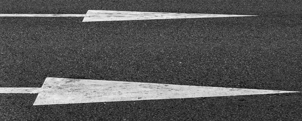 City banner background - lines and signposts on an asphalt road