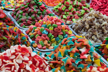 Background of colored jelly sweets shot close-up 