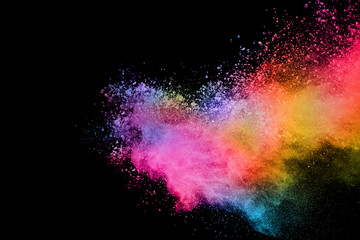 abstract colored dust explosion on a black background.abstract powder splatted background,Freeze...