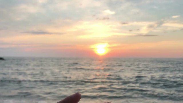 hand holding magic crystall ball over beautiful nature landscape, travel concept