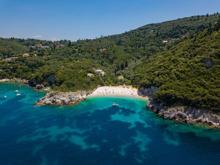 Fototapeta na wymiar Aerial view to Rovinia beach. Summer photo from drone. Corfu island, Greece