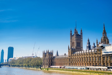 Fototapeta na wymiar British Parliament along the River Thames in London, UK.