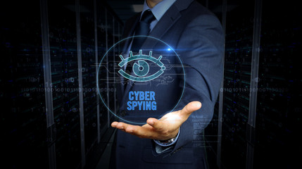 Businessman and screen with cyber eye hologram