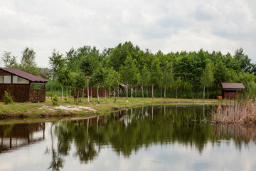 Fototapeta premium Holiday house near the lake. The concept of fishing and recreation