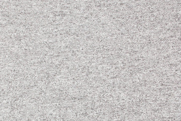 Real heather grey knitted fabric made of synthetic fibres textured background