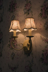 Beautiful vintage wall lamp in the bedroom. Interiors