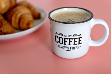 cup of coffee pink background