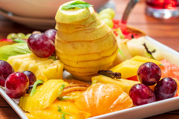 Pear, cherry and other healthy fruits on the table.