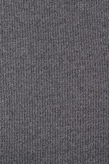 Textured dark gray fabric for the background