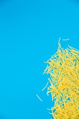 Top view Italy pasta on colored blue background