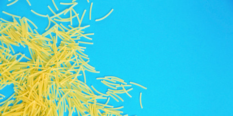 Top view Italy pasta on colored blue background