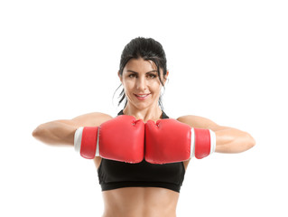 Sporty female boxer on white background