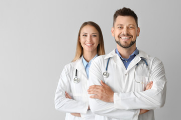 Fototapeta premium Portrait of doctors on light background