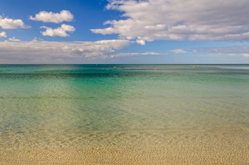 Colourful seascape with reflecting clouds - Busselton, WA, Australia