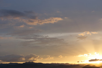 View of evening sky at sunset over the lake, Kang Krajarn National Park, Petchburi, Thailand