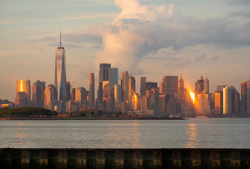 Dramatic Light Reflects off the Buildings and Infrastructure of Manhattan NY