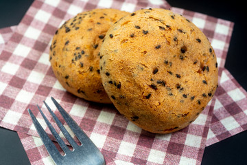Japanese Mochi Buns on Checkered Serviette and a fork