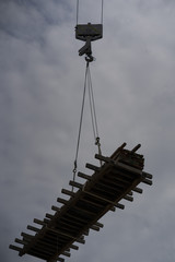 Obraz premium Crane lifts concreting rigging when building a house in Texas