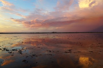 Cloud Reflections on a Salt Lake during Sunset