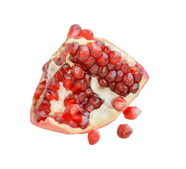 triangular slice of ripe pomegranate with seeds on a white background