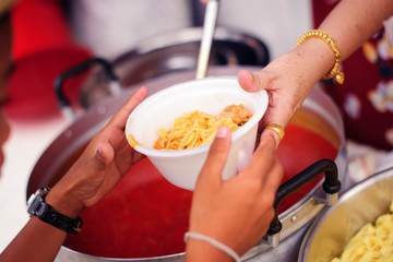 Concept of famine and social inequality : feeding food for beggar poverty concept : The society of helping to share food to the poor : Serving the Homeless Hungry and Poor